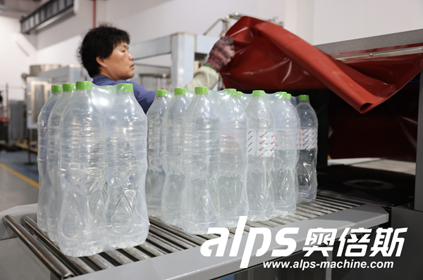 Water Production Line Output – Filled & Capped Bottles Ready for Packaging Water Production Line Output – Filled & Capped Bottles Ready for Packaging