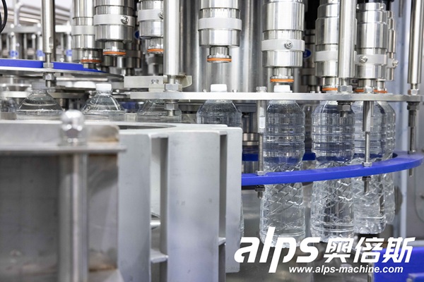 bottled-water-filling-nozzles-close-up bottled-water-filling-nozzles-close-up