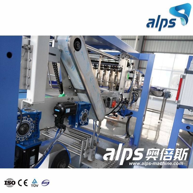 Что такое машина для упаковки бутылок с водой в термоусадочную пленку и как она работает?